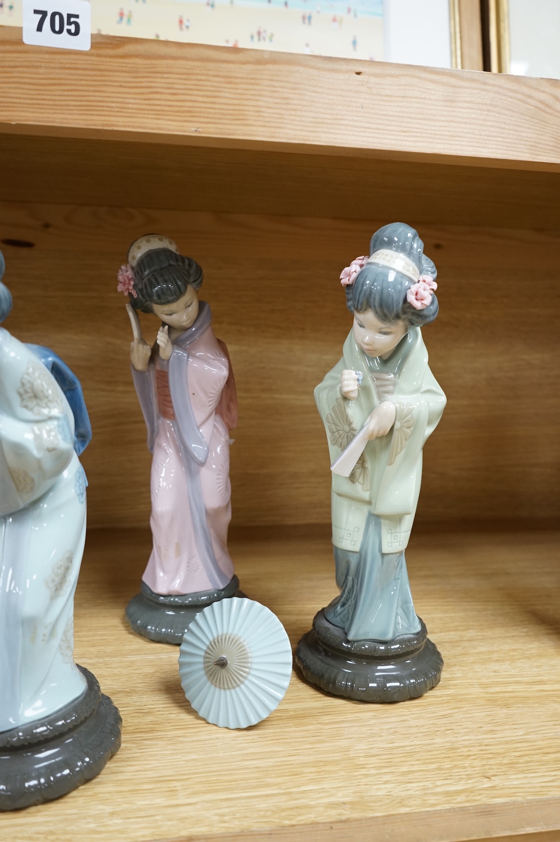 Four Lladro models of Geishas, tallest 30cm